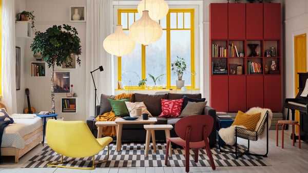 A pine IVAR shelving unit in the living room