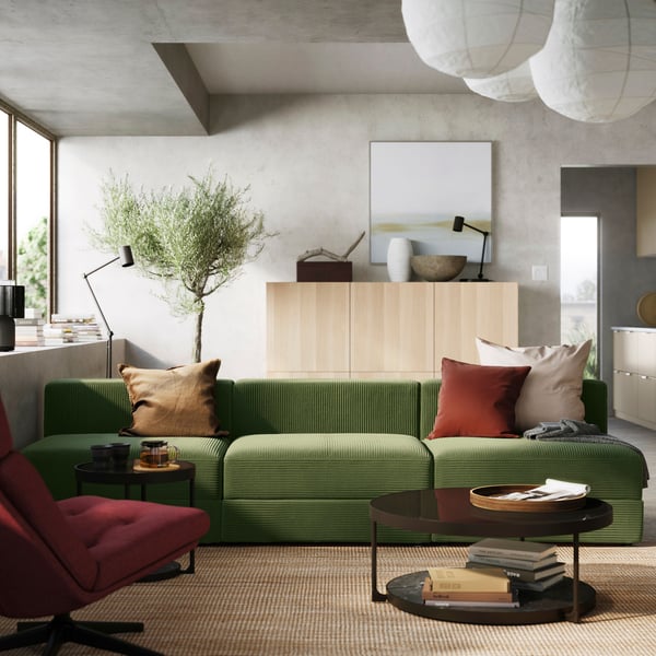 A green JÄTTEBO 4.5-seat sofa in a living room.
