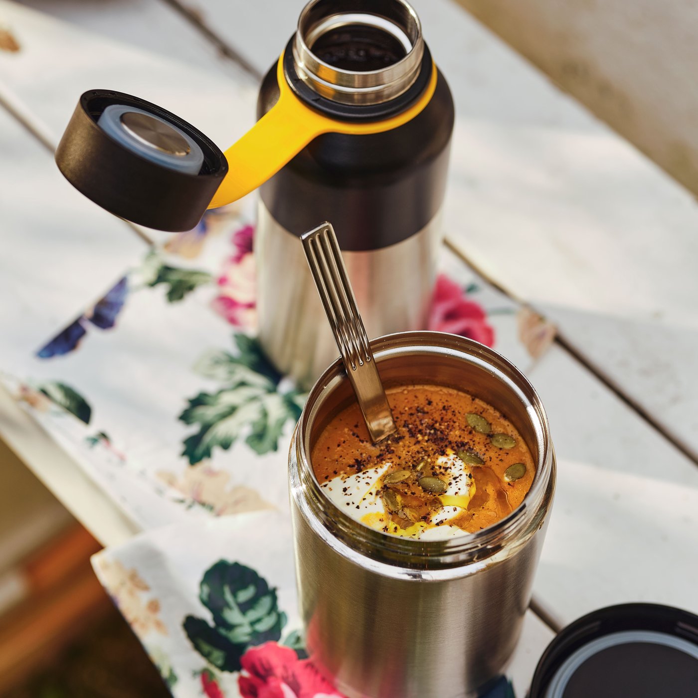 A multicolour/flower SMAKSINNE paper napkin outside