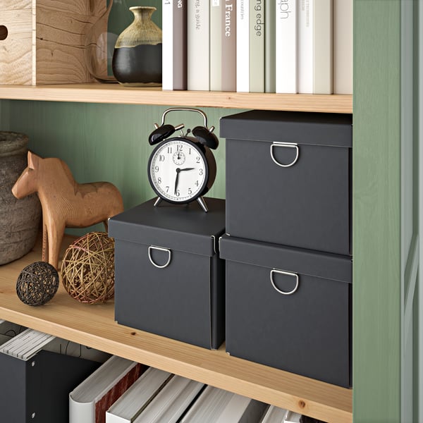 A grey-green/light brown stained HEMNES bookcase