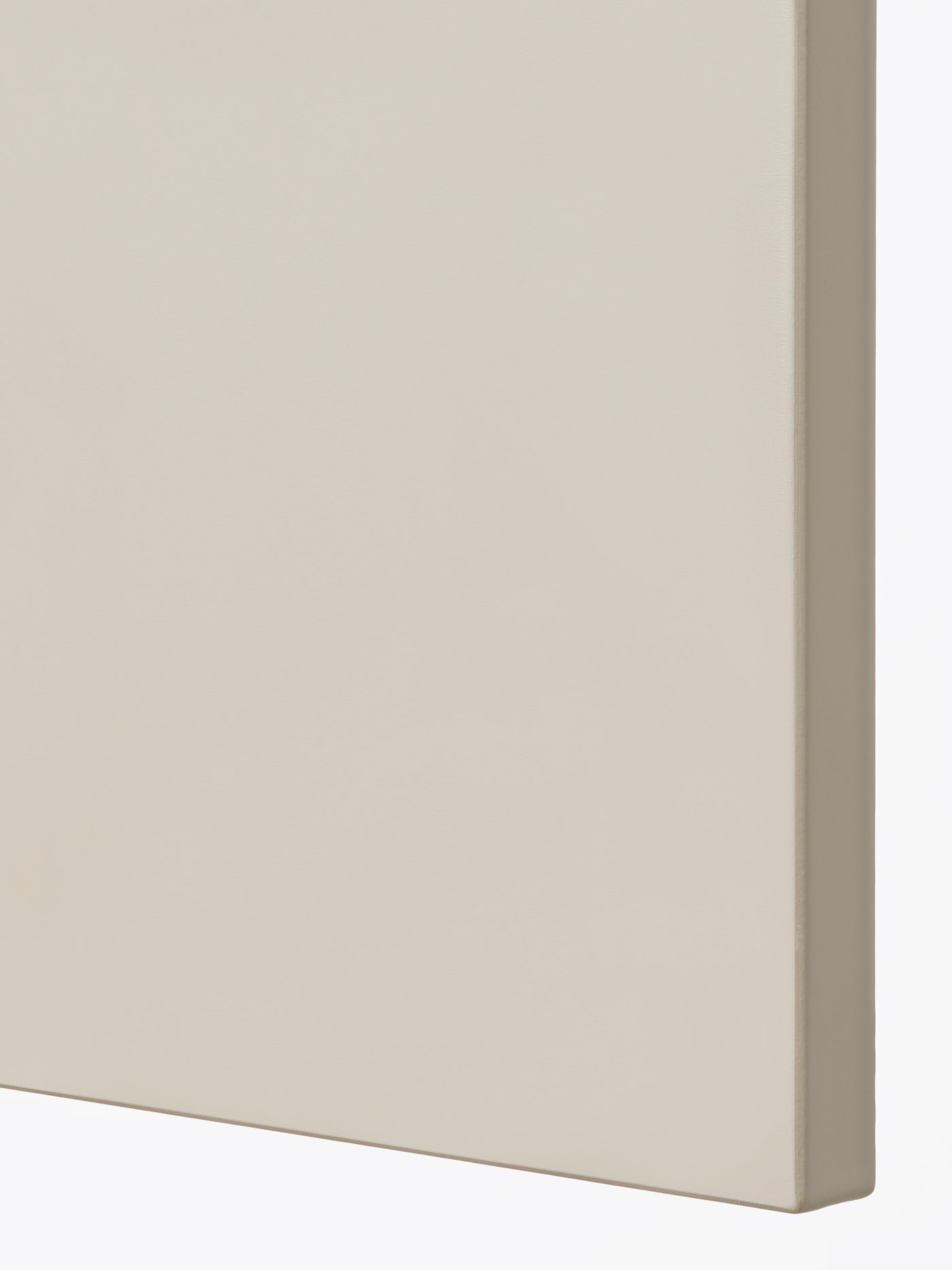 A beige HAVSTORP drawer front