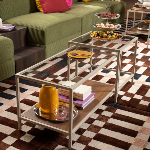 A clear glass/stainless steel KVITTERA serving stand, three tiers in the living room