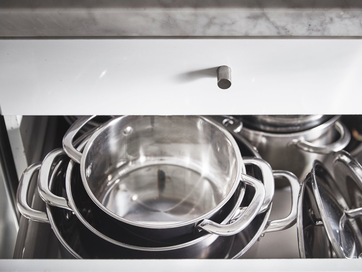 A stainless steel IKEA 365+ pot with lid