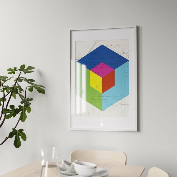 An IKEA RÖDALM white picture frame mounted on the wall on top of a sideboard in the living room. 