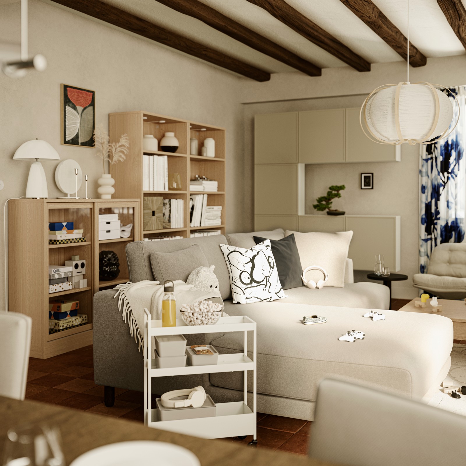 A TONSTAD bookcase and a cabinet with sliding glass doors stand behind an UPPÅKRA 3-seat modular sofa with chaise longue.