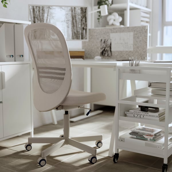 A beige FLINTAN office chair