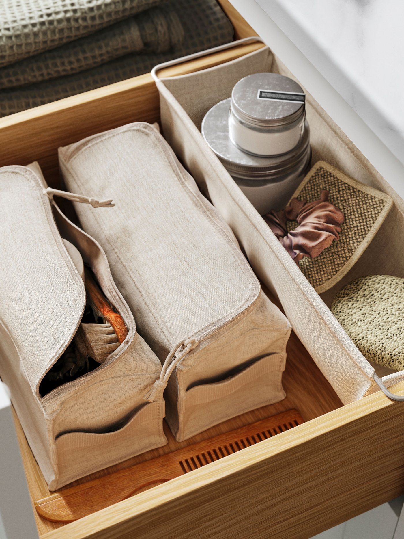 A hanging/beige BOLLÖSUND drawer organiser