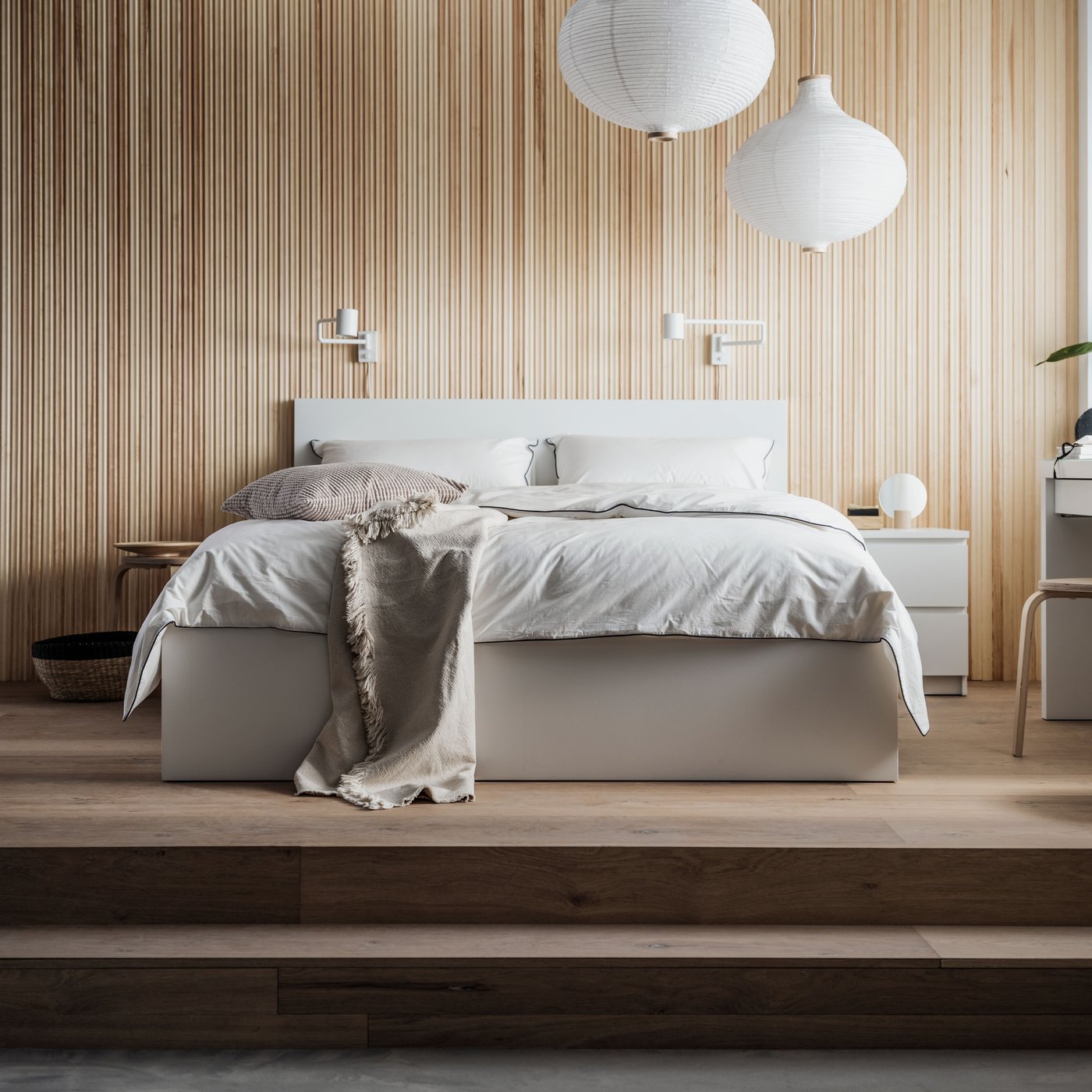 A white MALM chest of 2 drawers in the bedroom