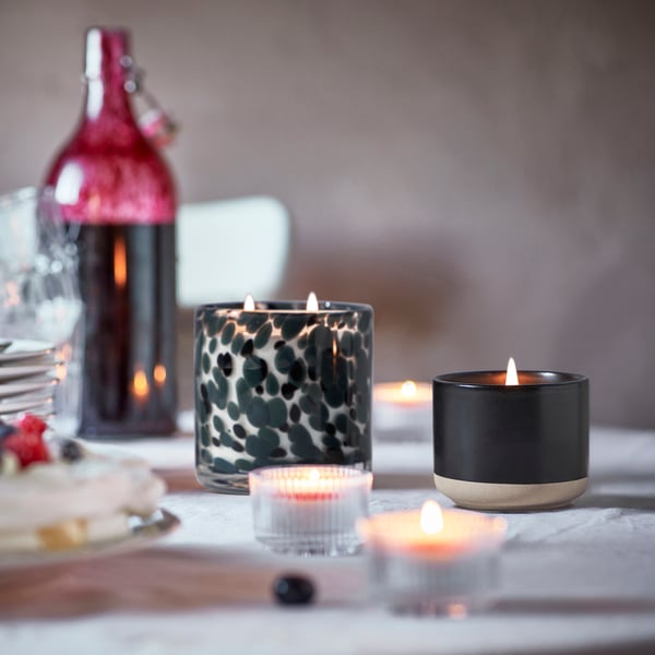 A Berries/dark grey STÖRTSKÖN scented candle in glass, 2 wicks