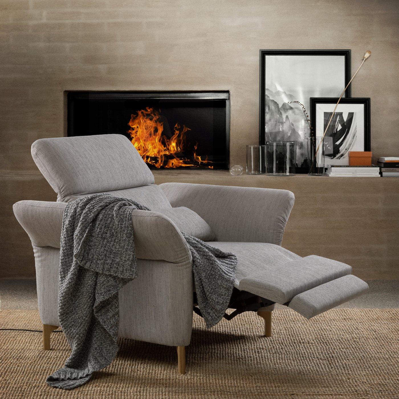 A wood/Viarp beige/brown FAMMARP recliner, electric in the living room