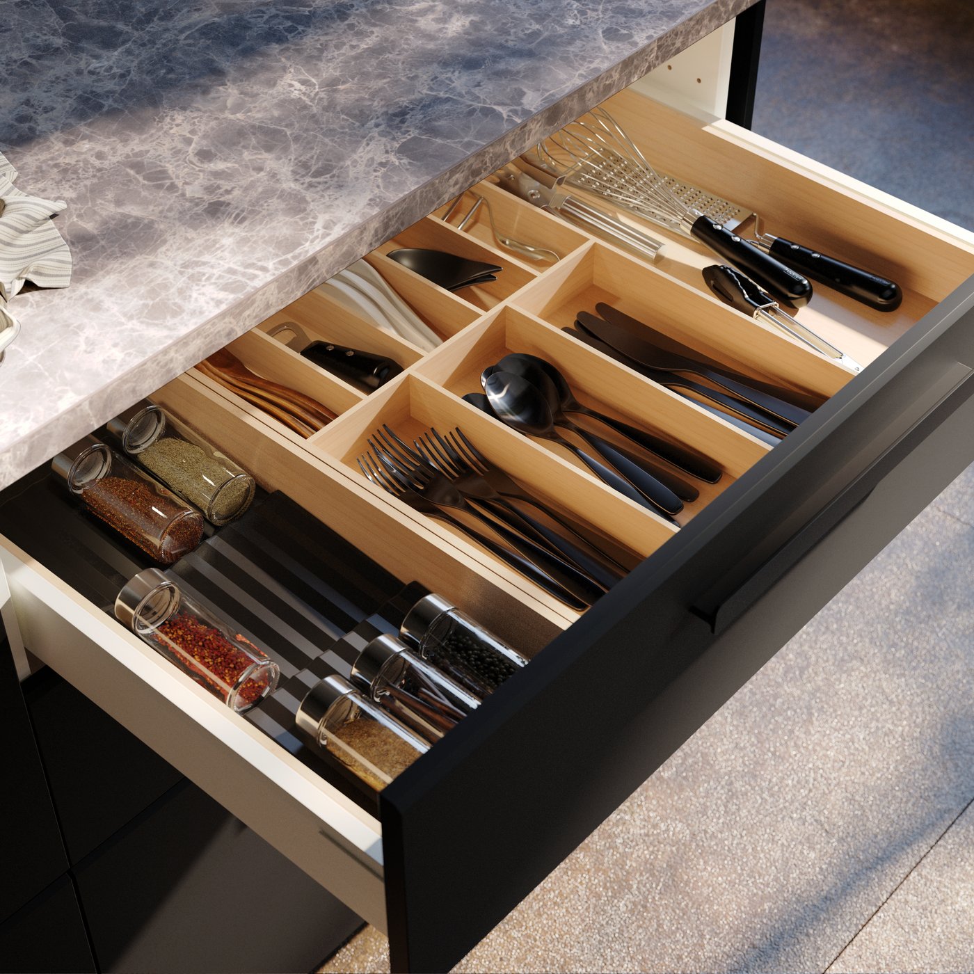 A light bamboo UPPDATERA cutlery tray in the kitchen