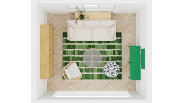 An overview image of a room layout from above showing furniture, rugs, storage, and placement of decor in a rectangular room.