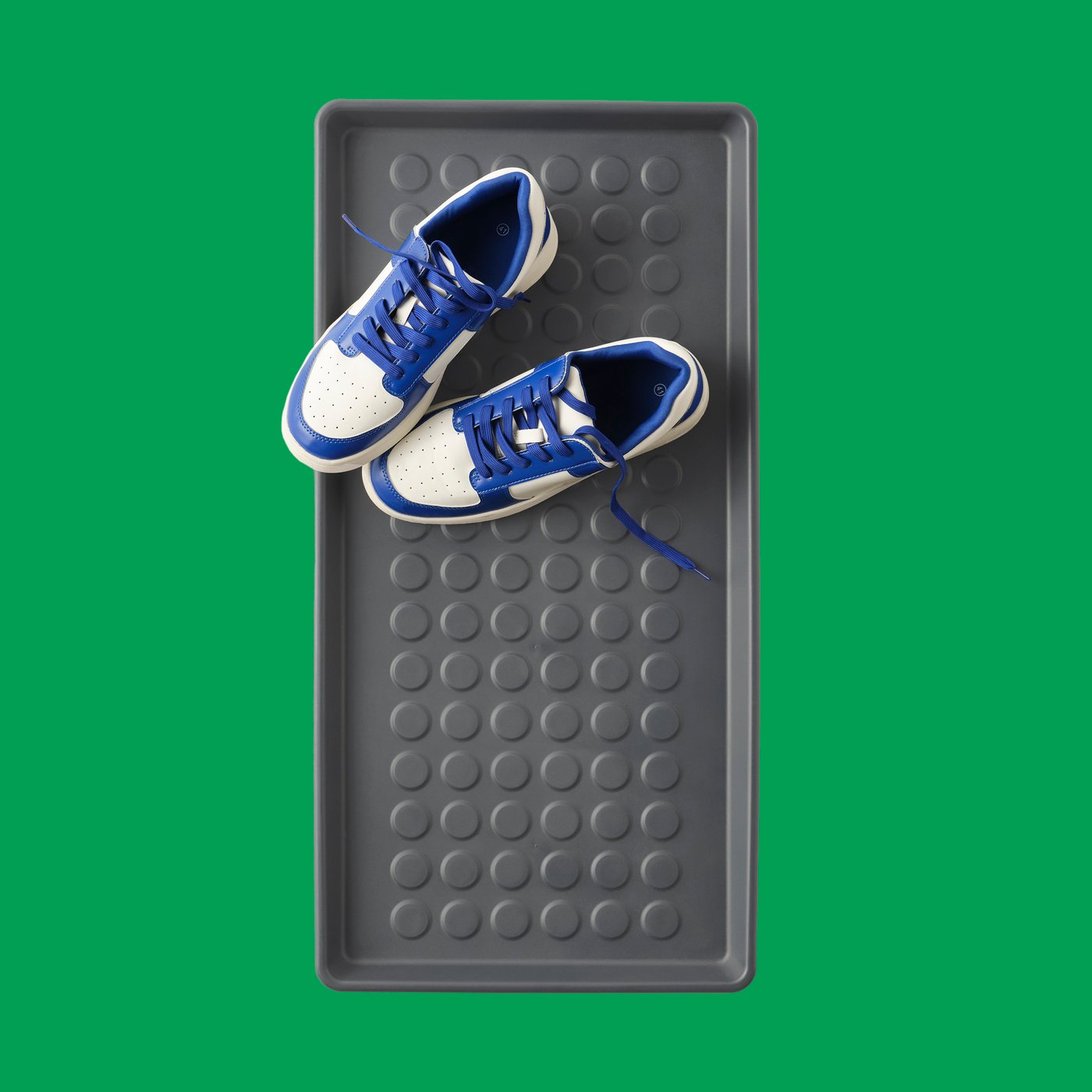 An in/outdoor/grey BAGGMUCK shoe mat in the NA
