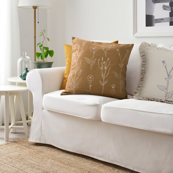 A brown embroidery ÅKERNEJLIKA cushion cover