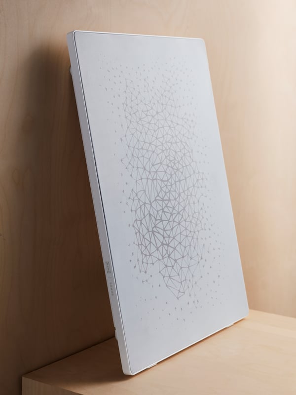 Close-up of a white SYMFONISK picture frame with WiFi speaker.