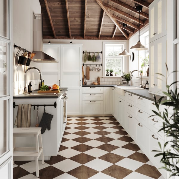 A white wood effect ENKÖPING glass door in the kitchen