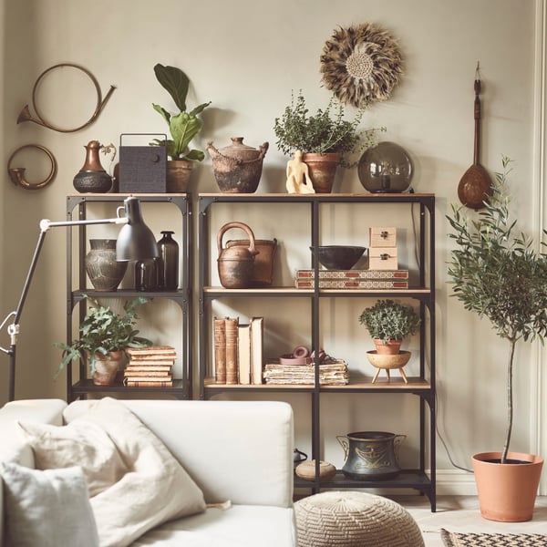 A black FJÄLLBO shelving unit