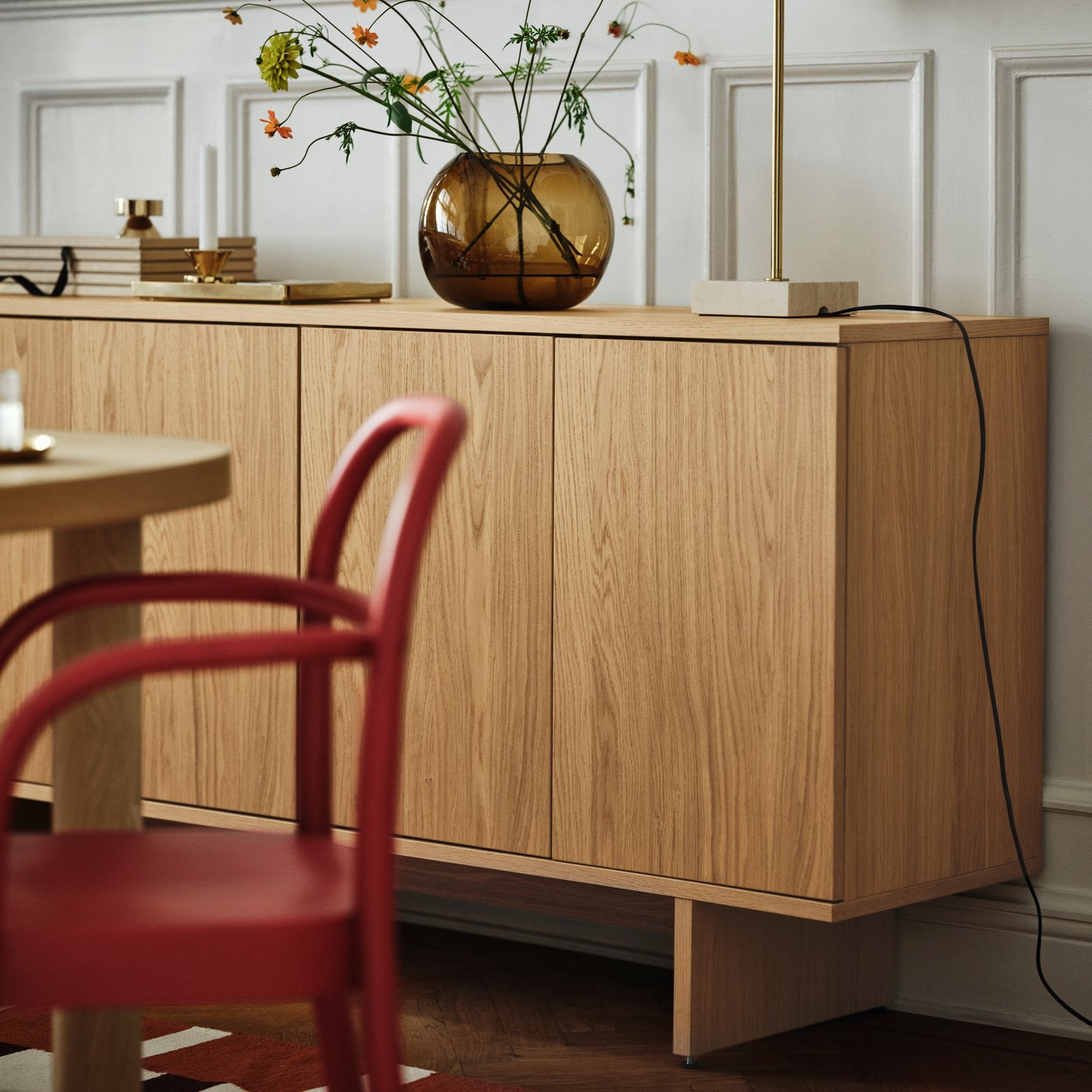 A white JUBLA unscented chandelier candle