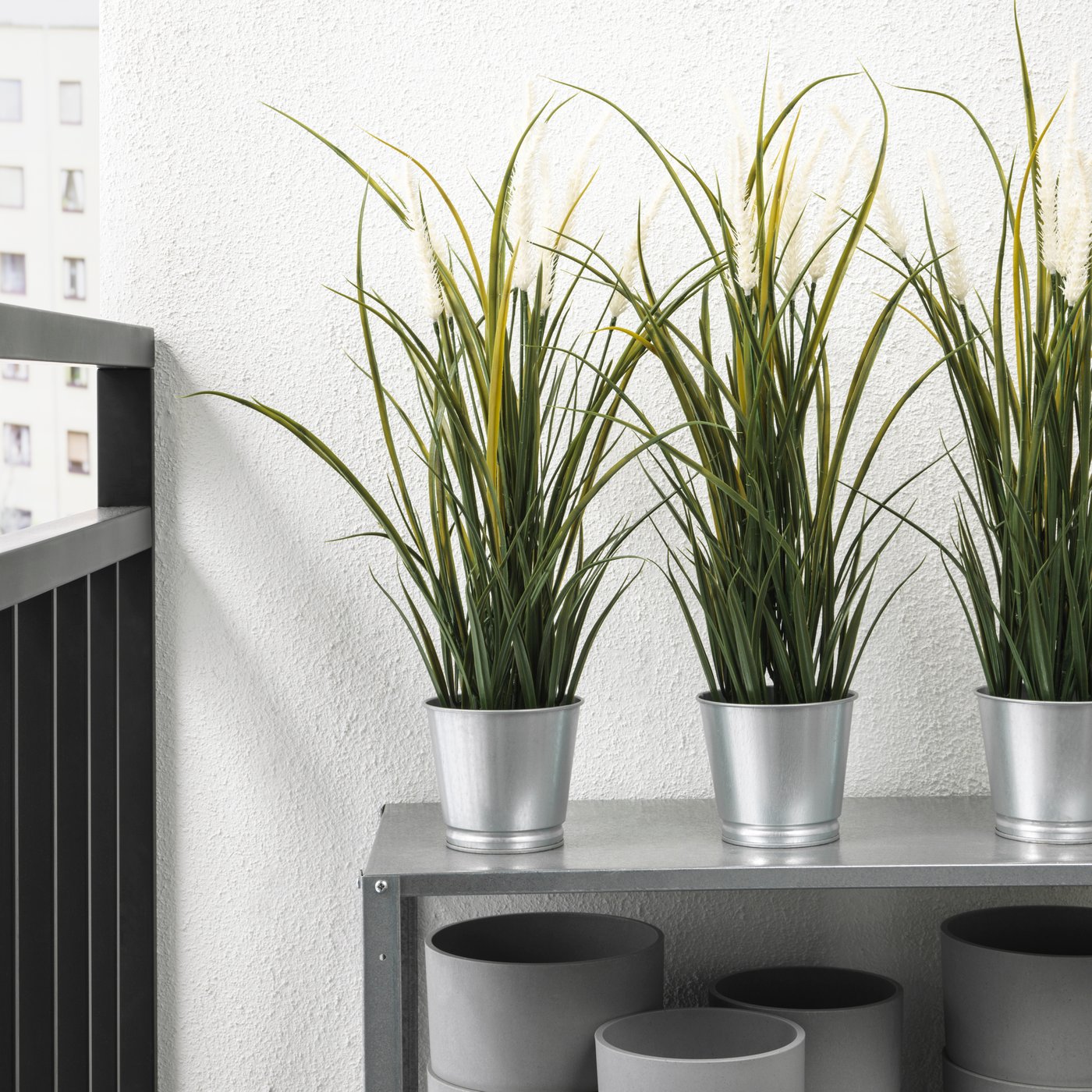 An in/outdoor decoration/grass FEJKA artificial potted plant