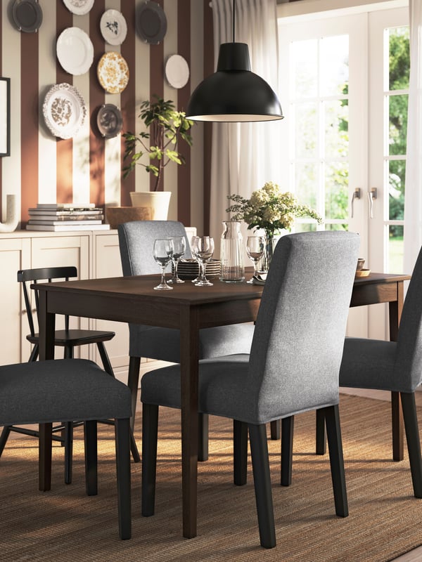 A dark brown stained/beech veneer NÄSINGE table