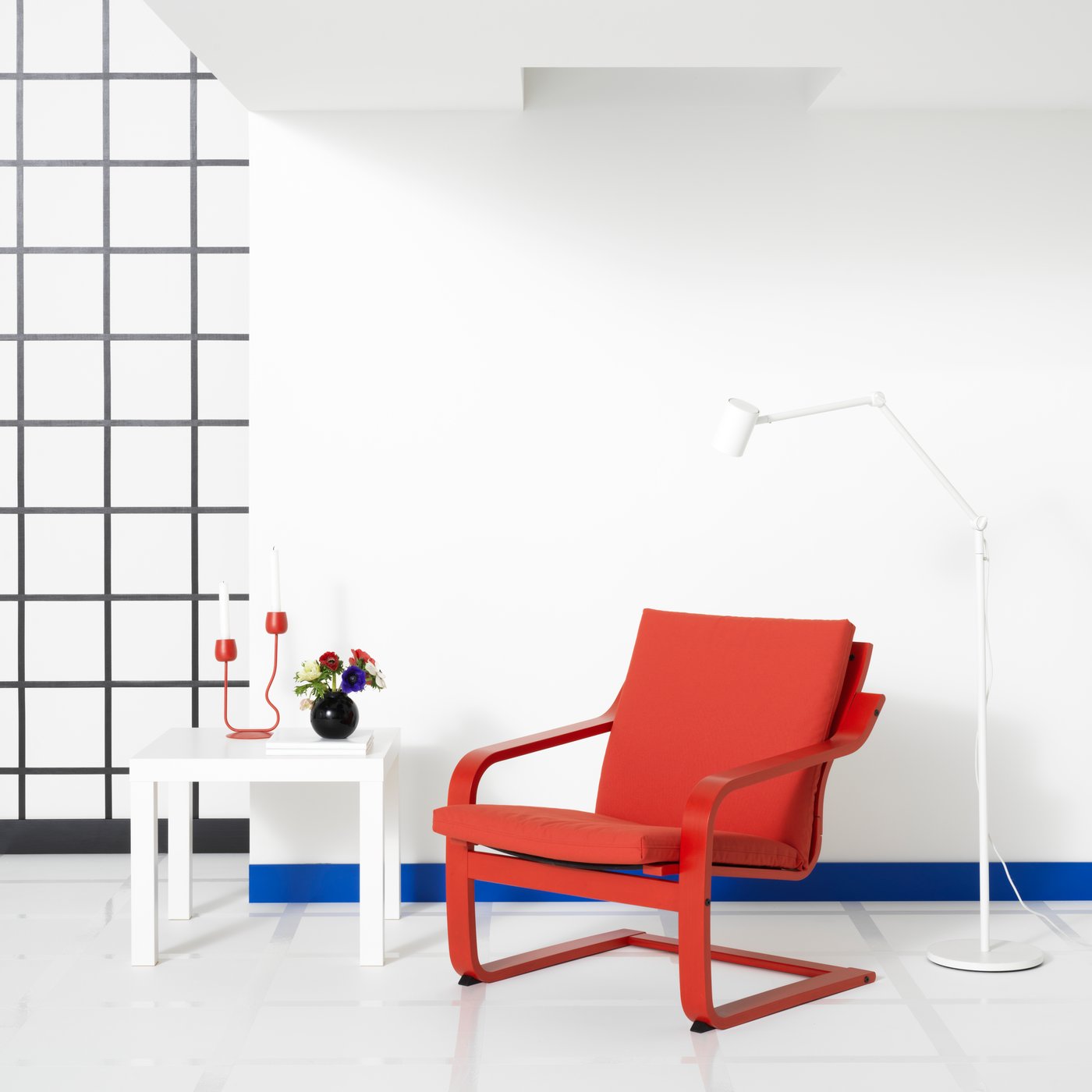 A bright red SILVERPÄRON candlestick/tealight holder