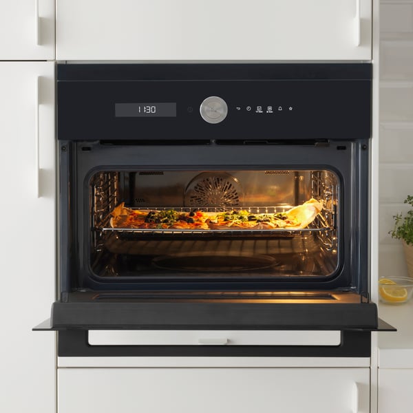 An IKEA 700 black FINSMAKARE microwave combi with forced air