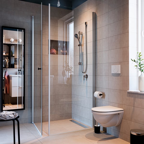 a bathroom with glass enclosure for the shower