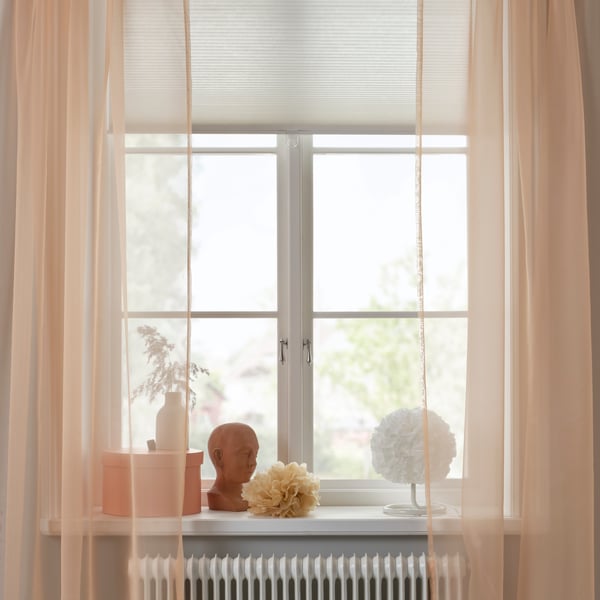An orange/with rod pocket TERESIA sheer curtains, 1 pair