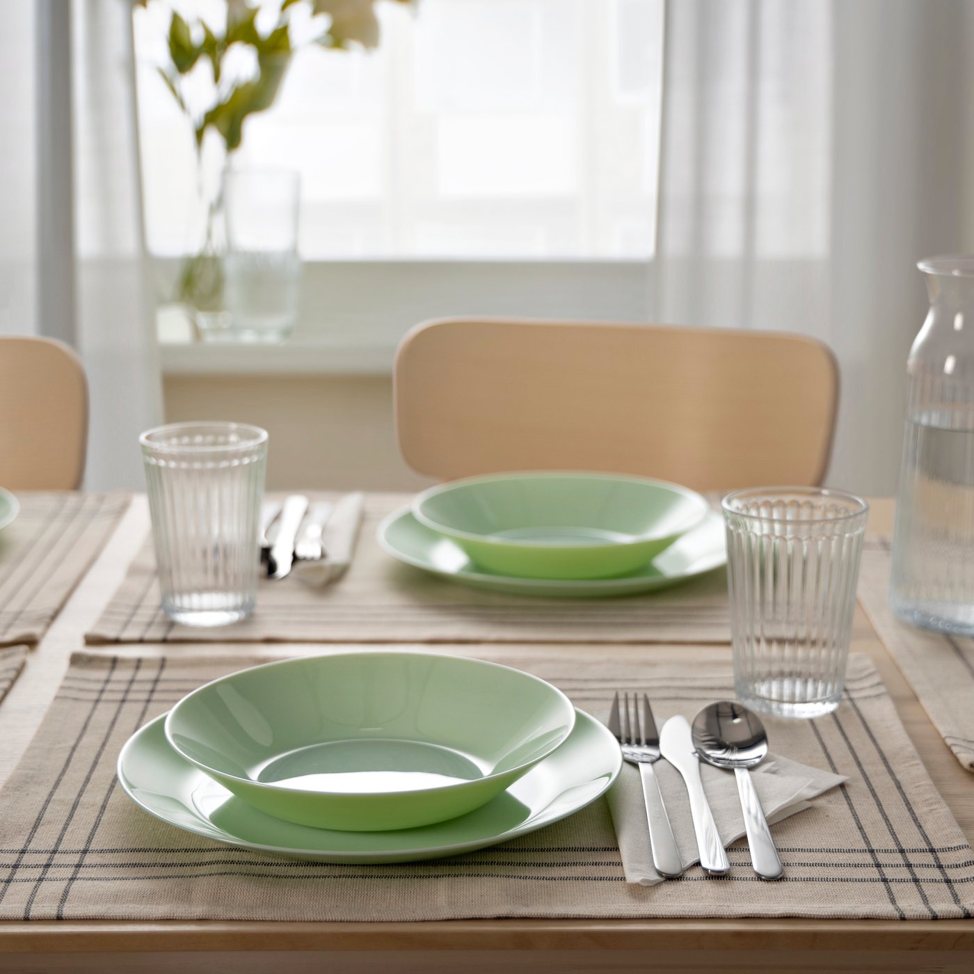 A light green OFTAST deep plate