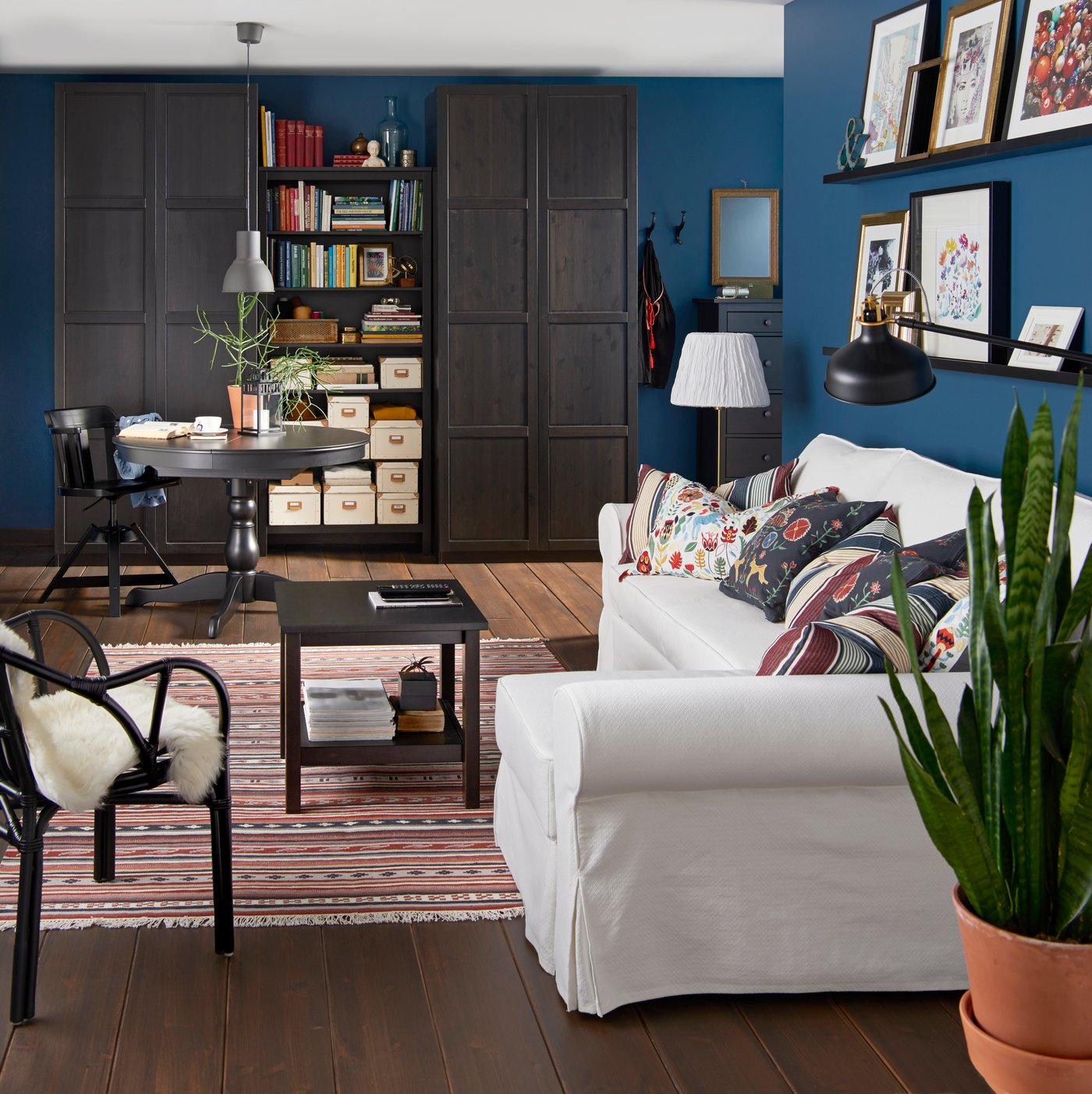 A black-brown HEMNES bookcase in the living room