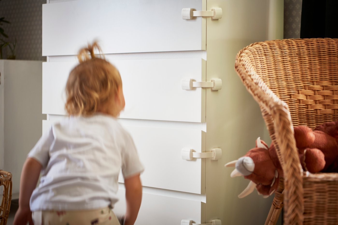 A white UNDVIKA multi latch in the childrens room