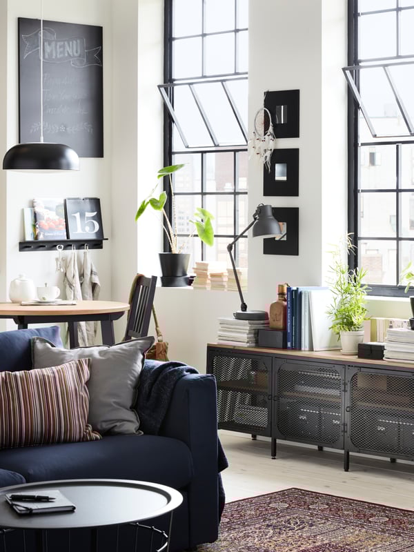 A light antique stain/black stained GAMLARED table in the living room