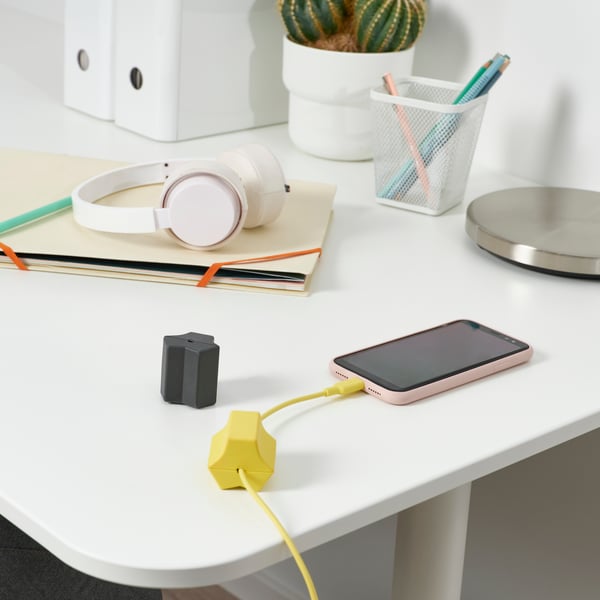 A black/yellow HAVSKÅL 2-piece, USB anchor.