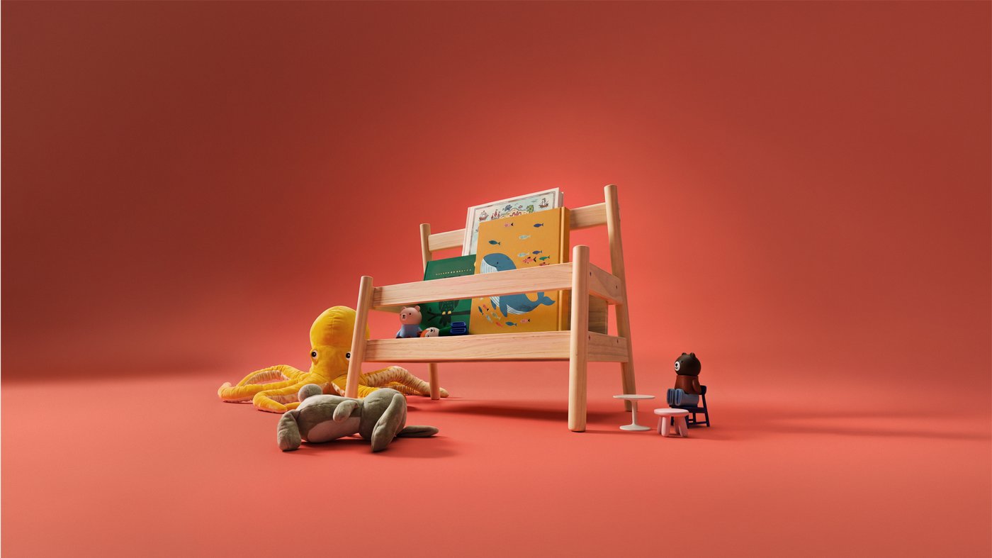 Rangement pour livres FLISAT sur fond rouge.