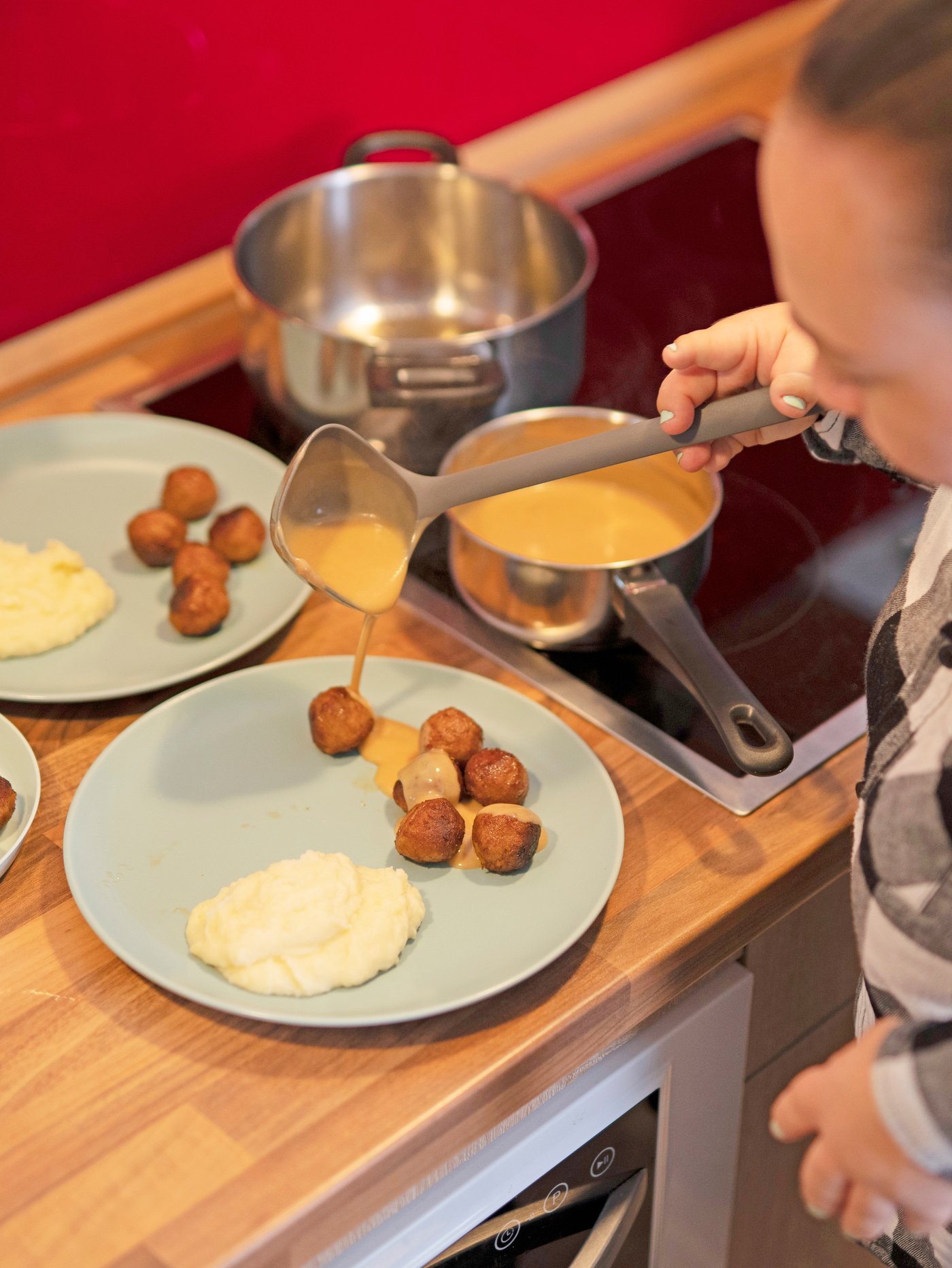 A grey FULLÄNDAD soup ladle