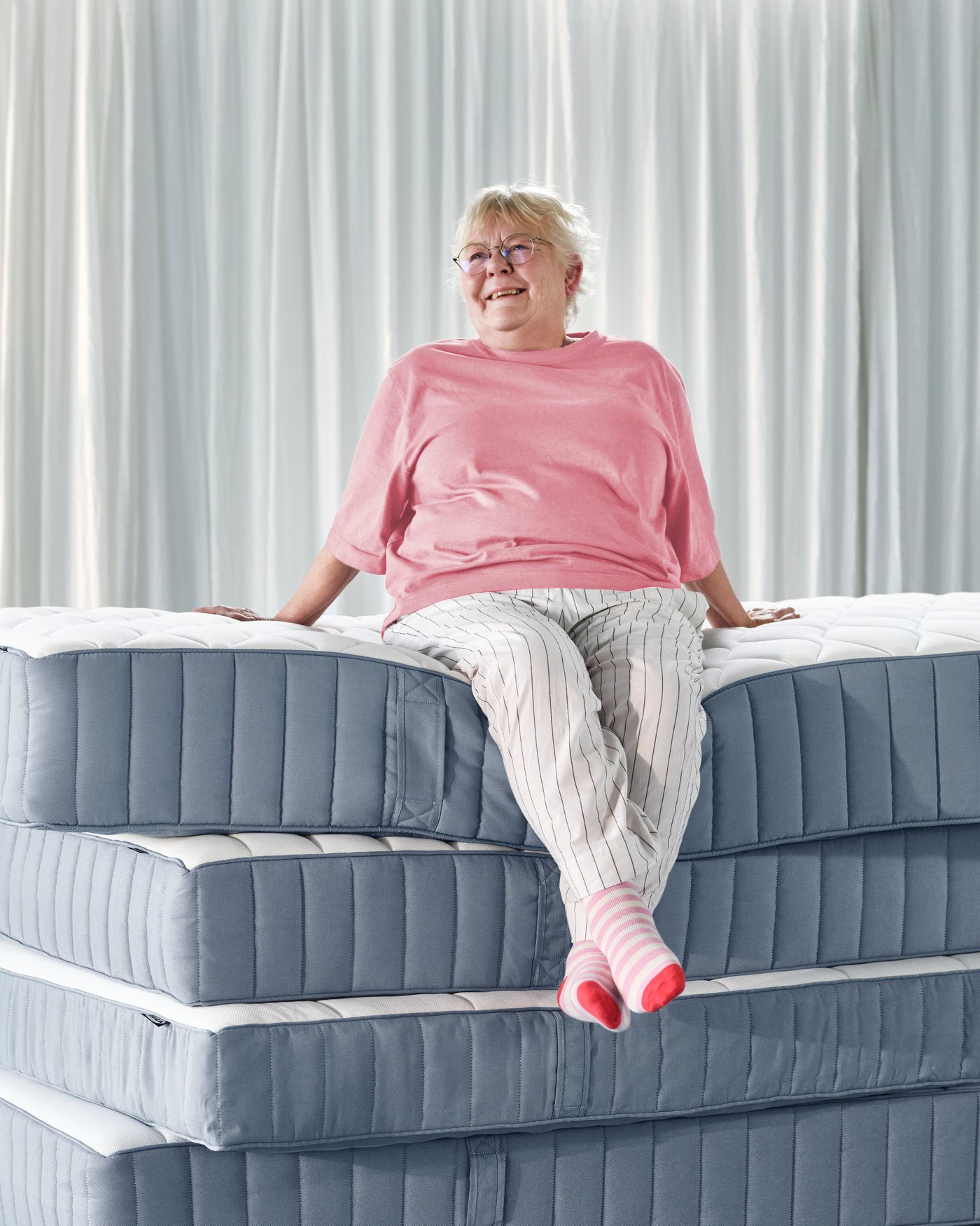 A medium firm/light blue VESTERÖY pocket sprung mattress