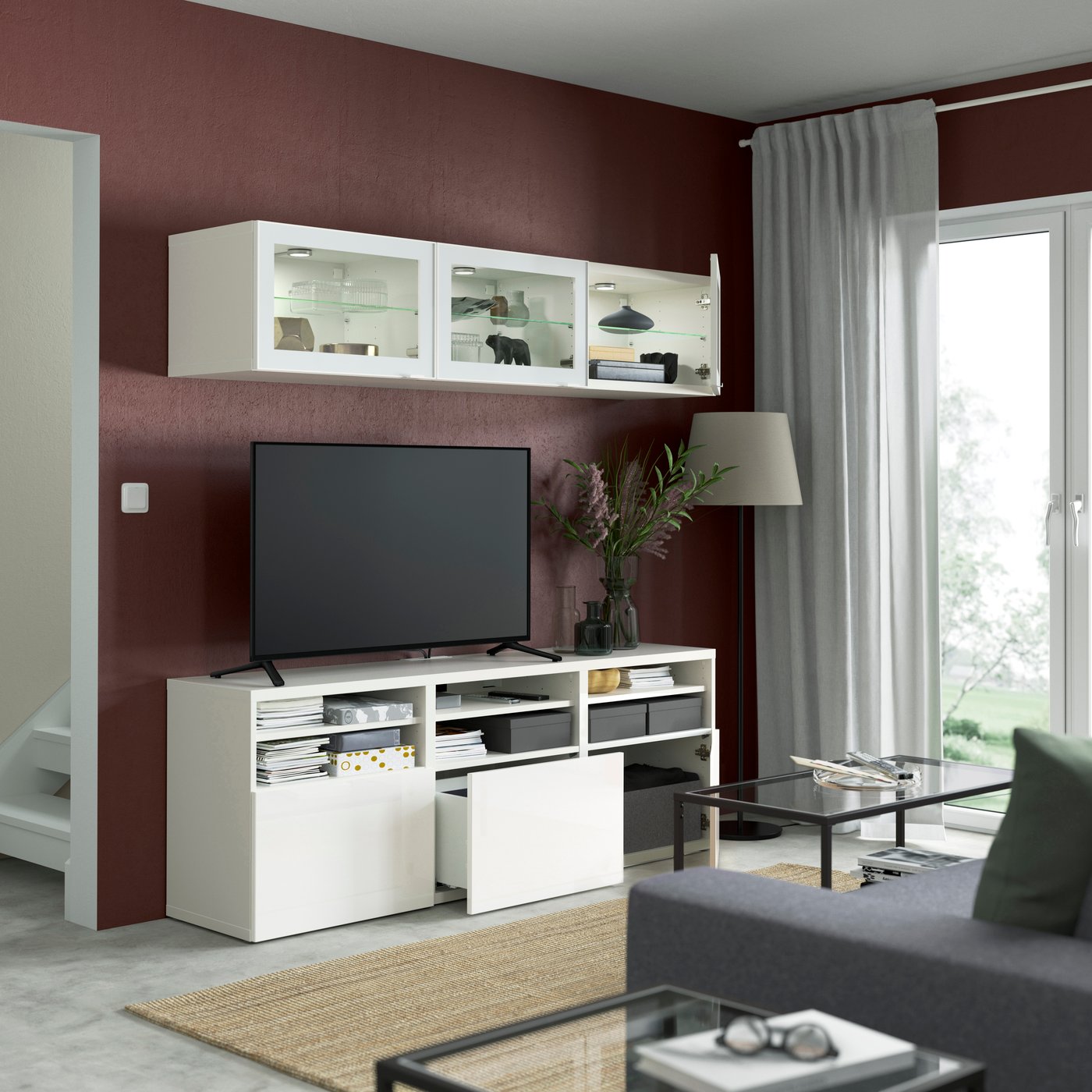 A white/Selsviken high-gloss/white clear glass BESTÅ TV storage combination/glass doors