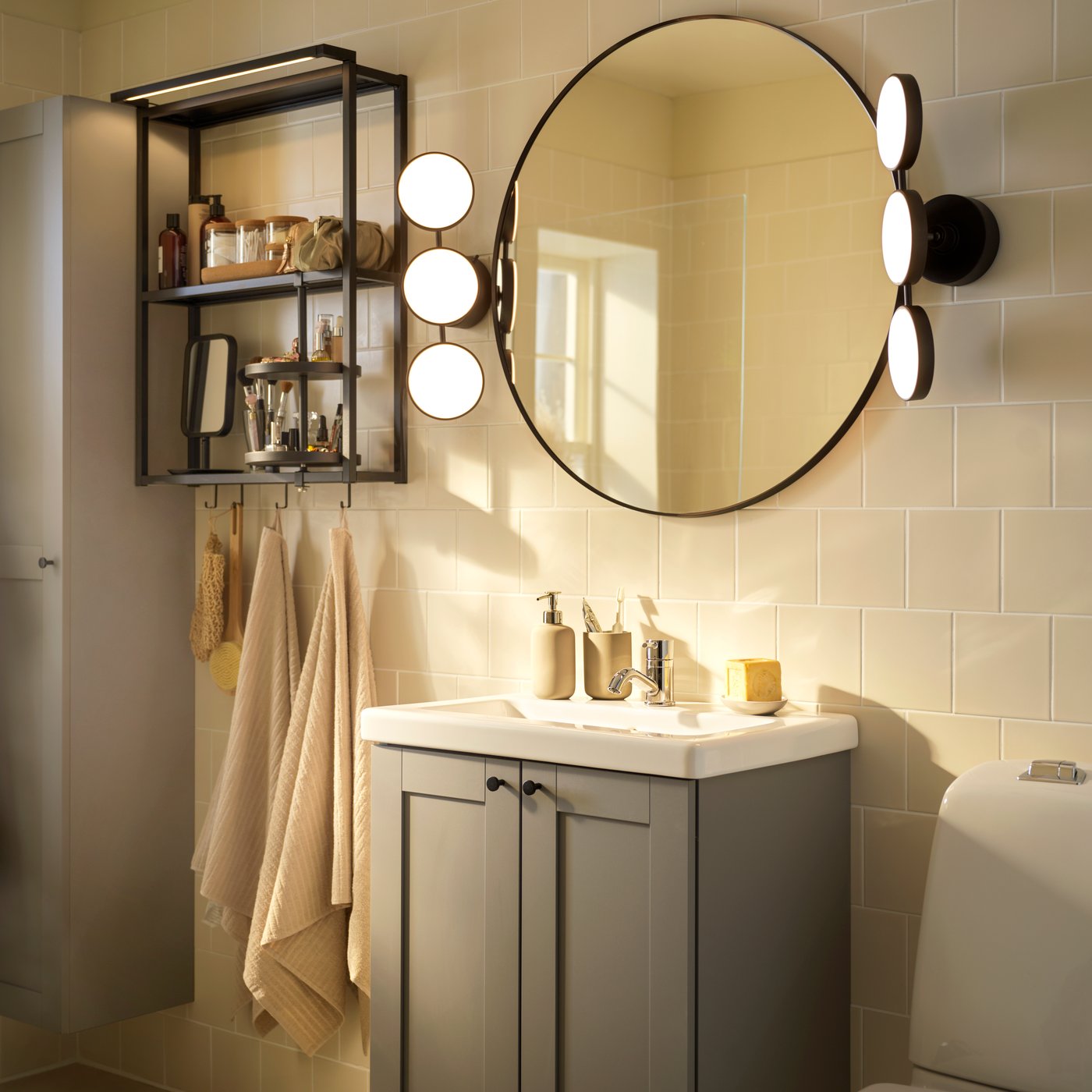 A black LINDBYN mirror in the bathroom