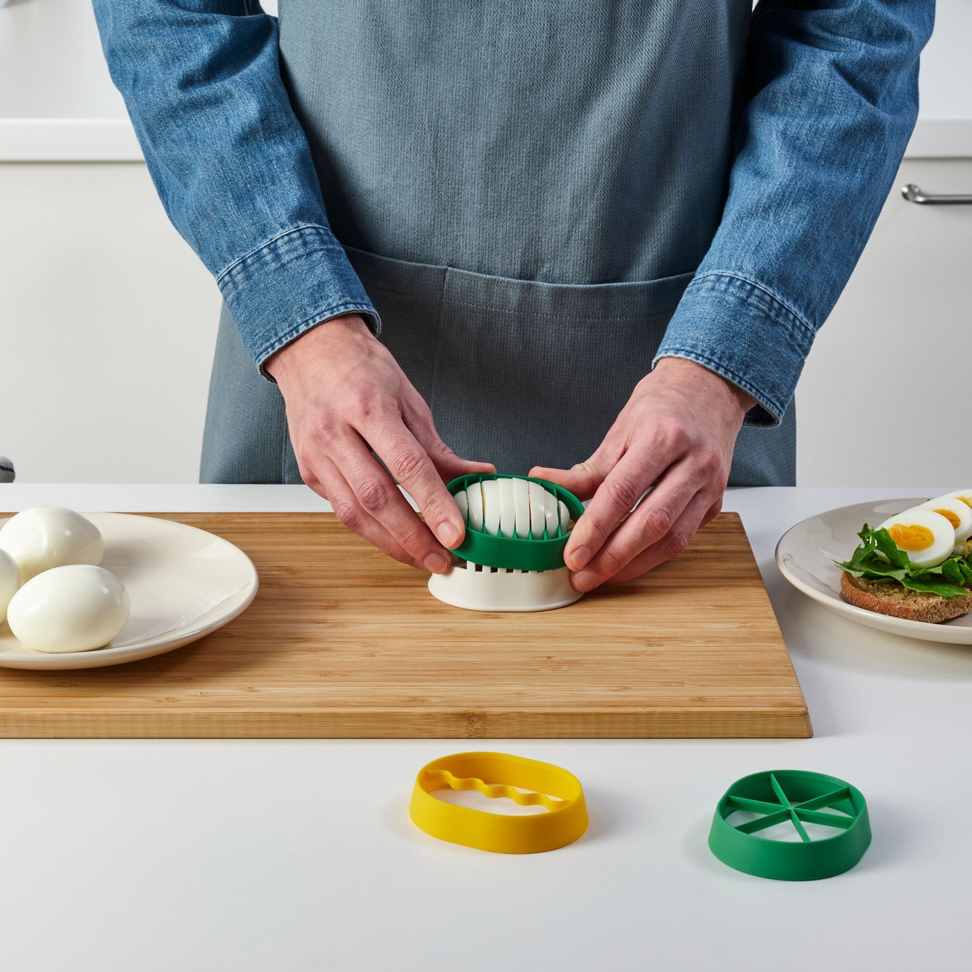 A mixed colours UPPFYLLD egg slicer
