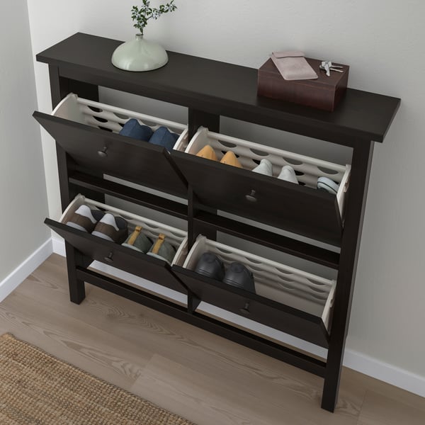 A black-brown HEMNES shoe cabinet with 4 compartments