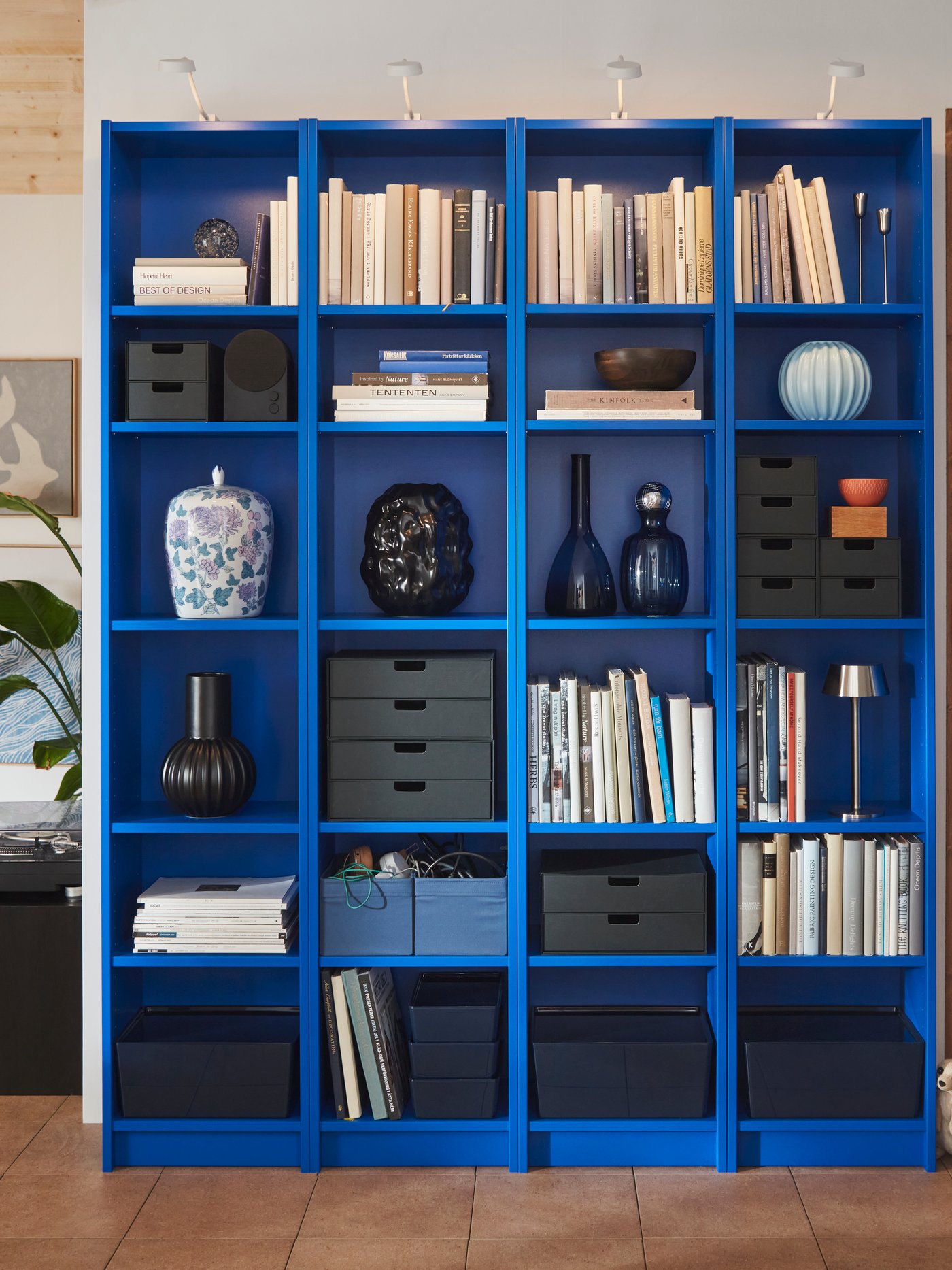A blue BILLY bookcase in the living room