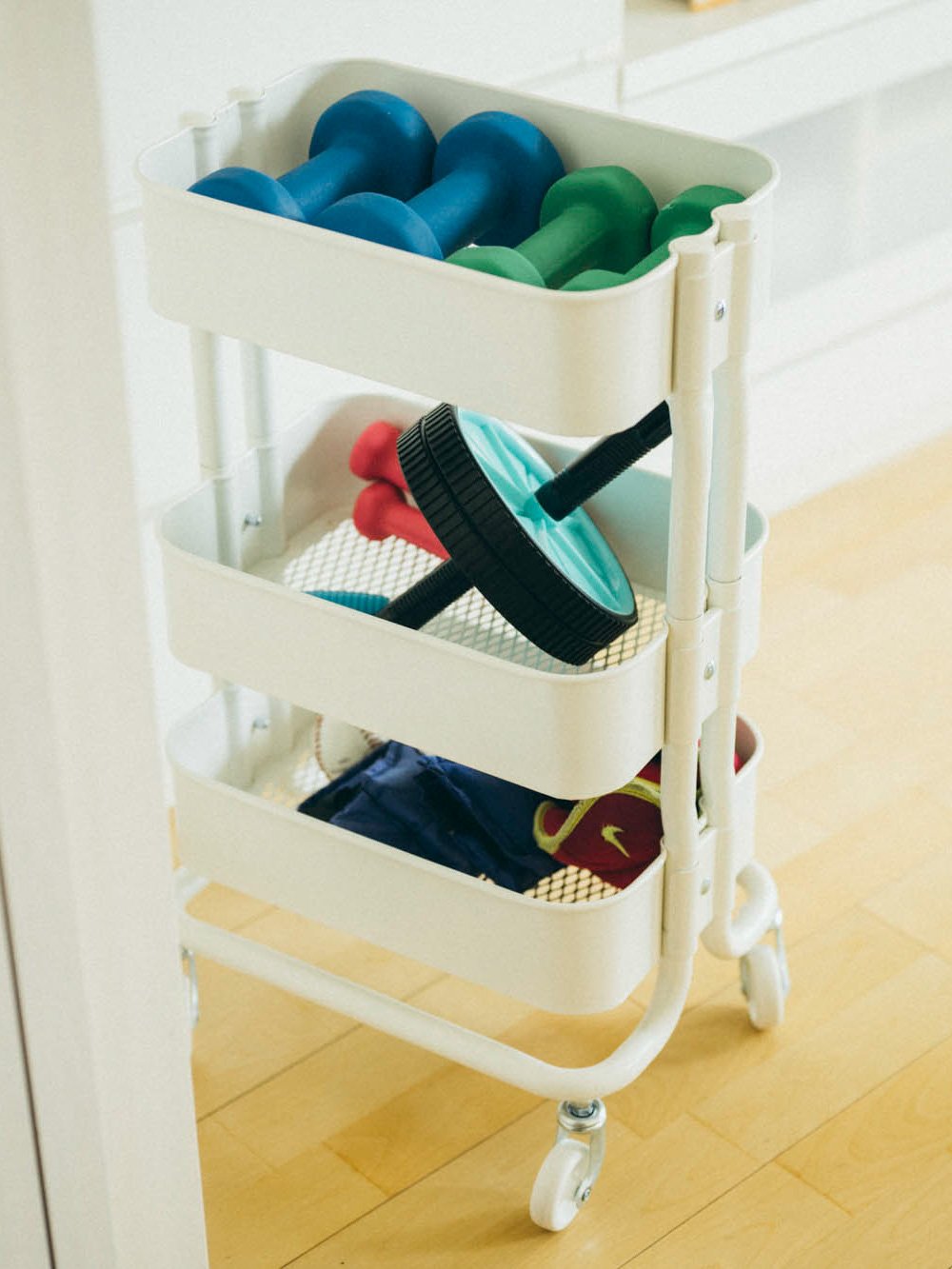 A white RÅSKOG trolley