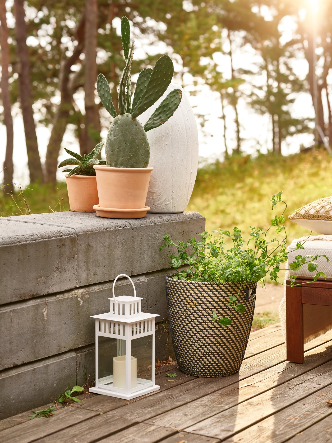 An in/outdoor dark grey/beige RÅGKORN plant pot