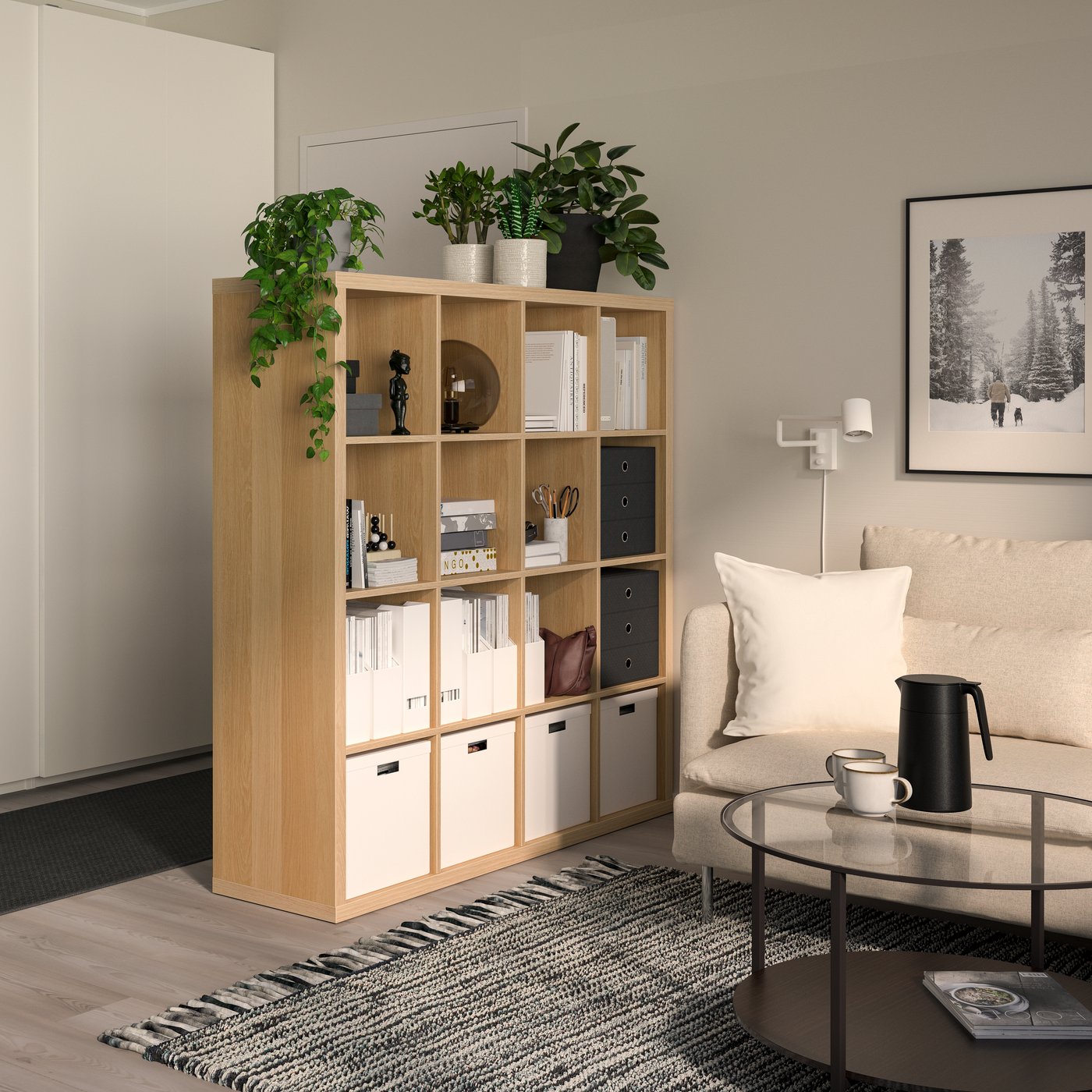 An oak effect KALLAX shelving unit