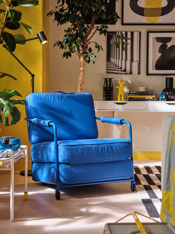 A blue BRÄNBOLL gaming chair