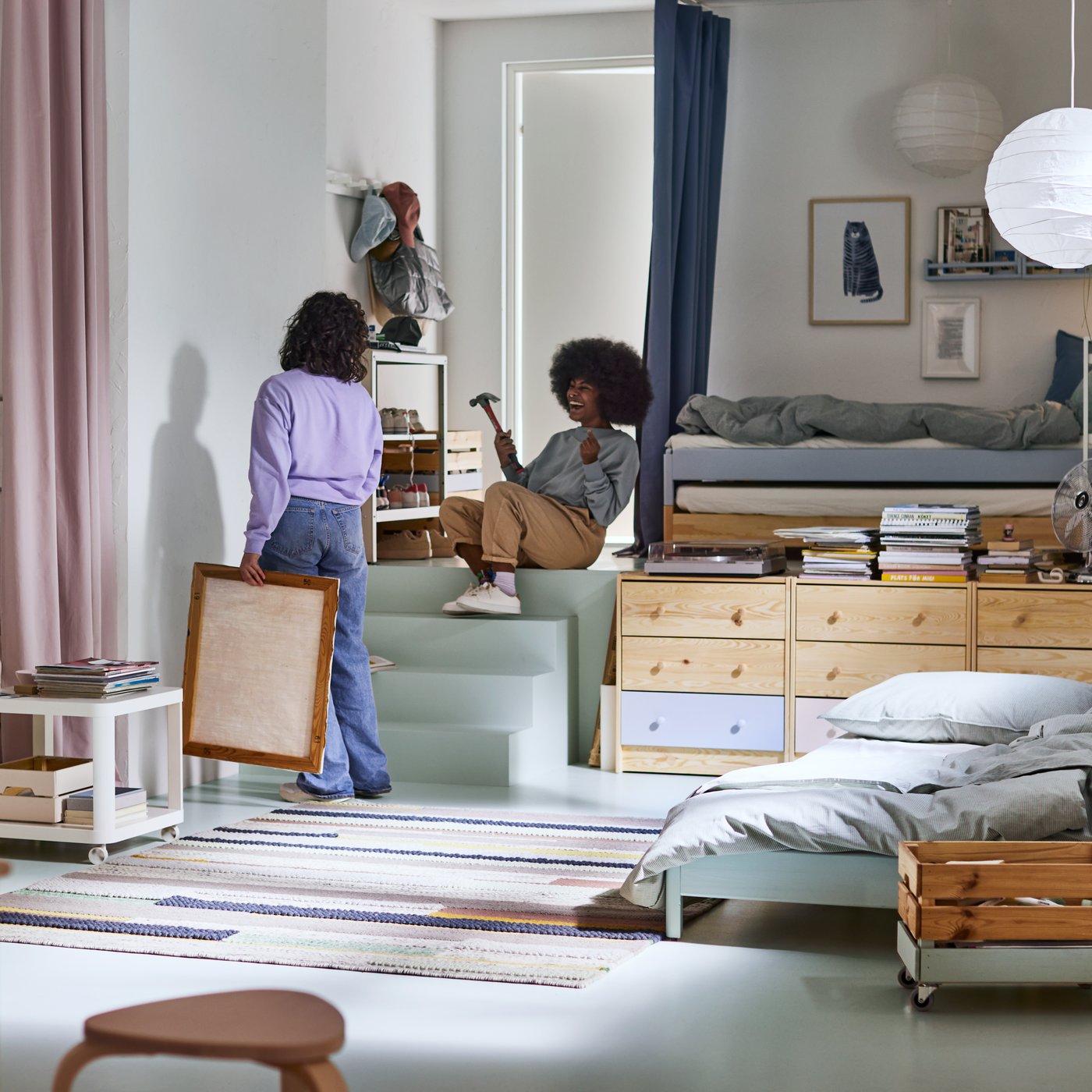 A pine UTÅKER stackable bed in the childrens room