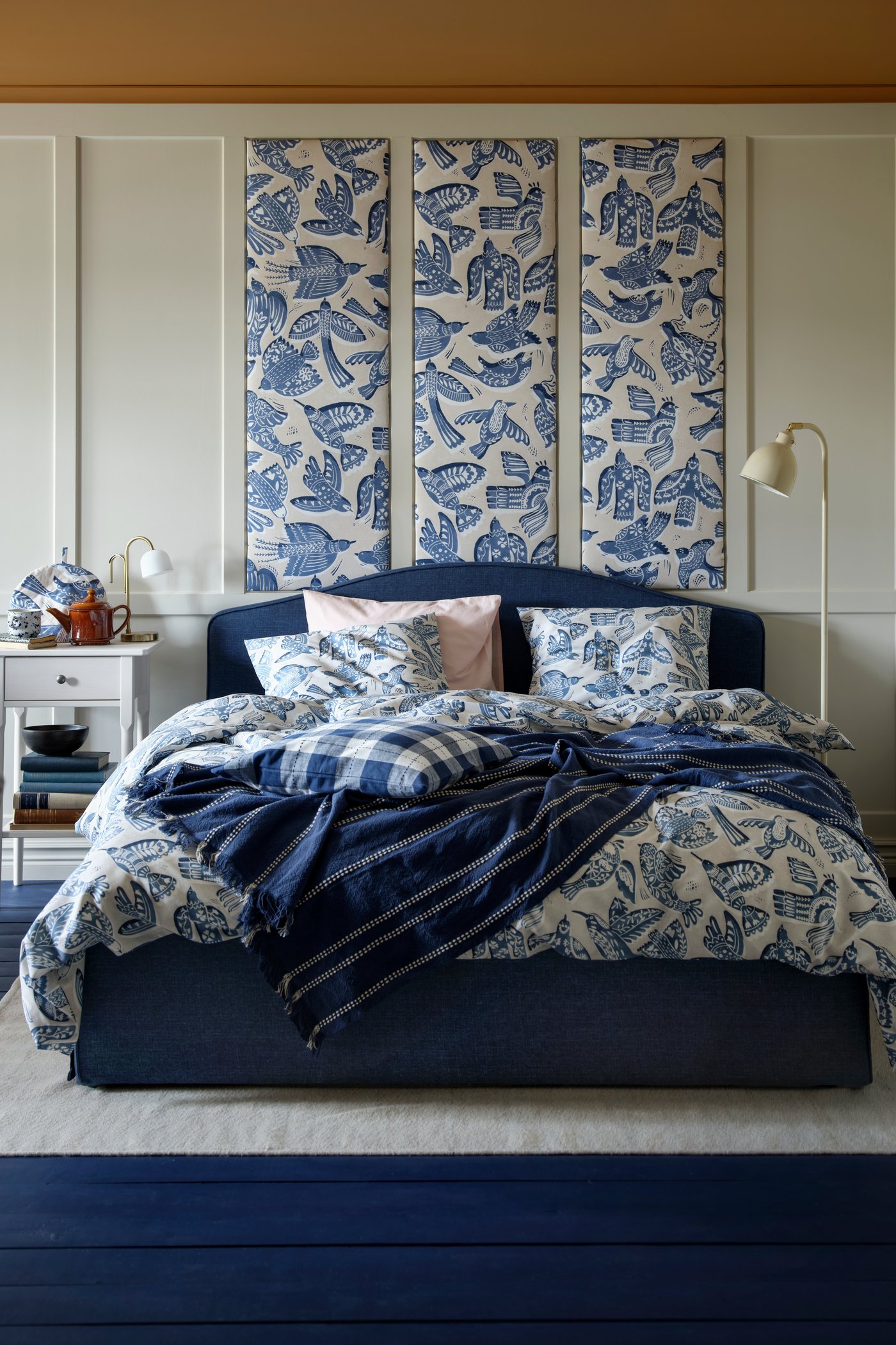 A beige/blue/bird pattern BITTERSÖTA pre-cut fabric in the bedroom