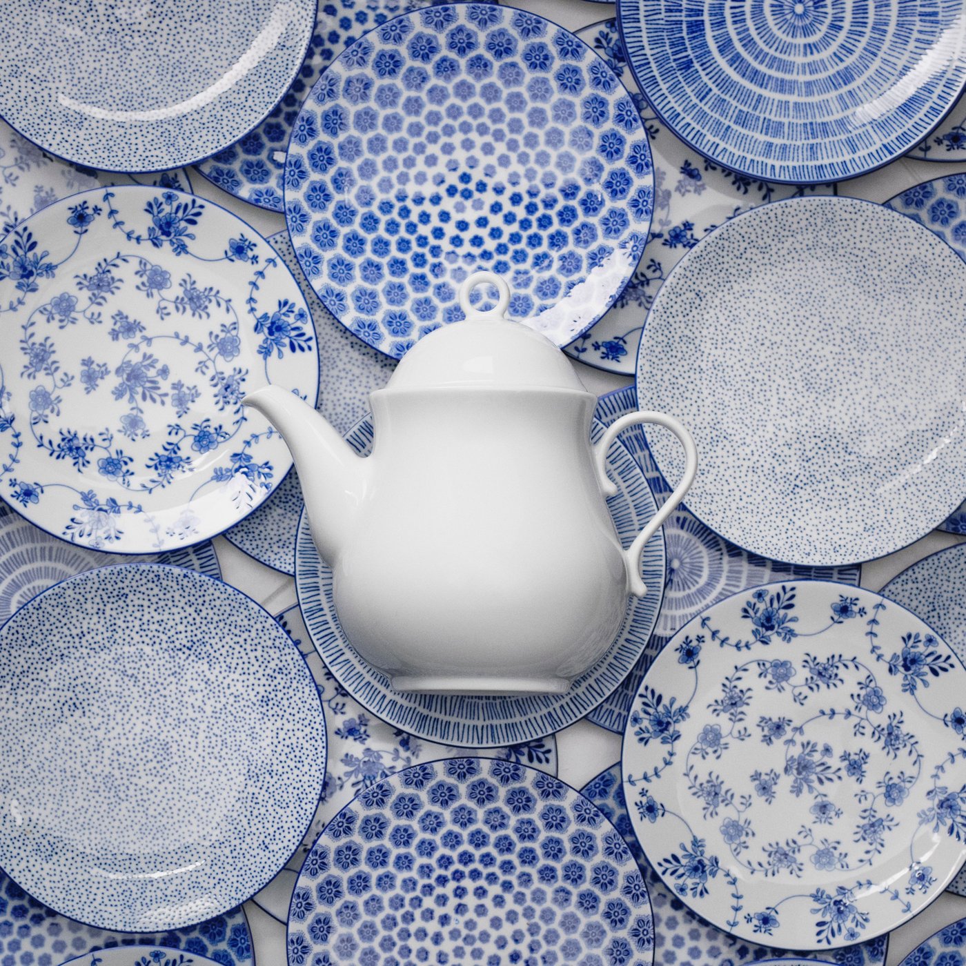A patterned/blue ENTUSIASM side plate