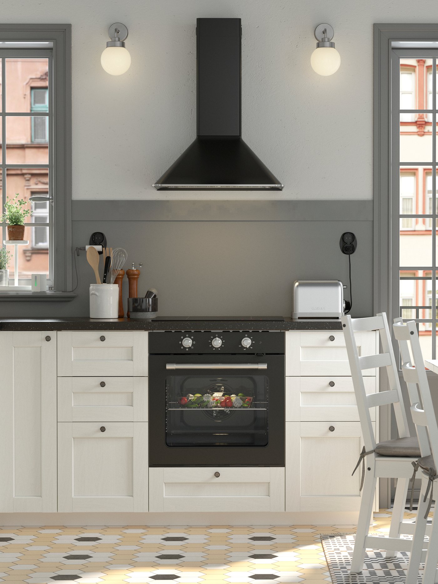 A black and white traditional-style kitchen with a white NORDVIKEN dining table surrounded by three chairs and a pine bench.