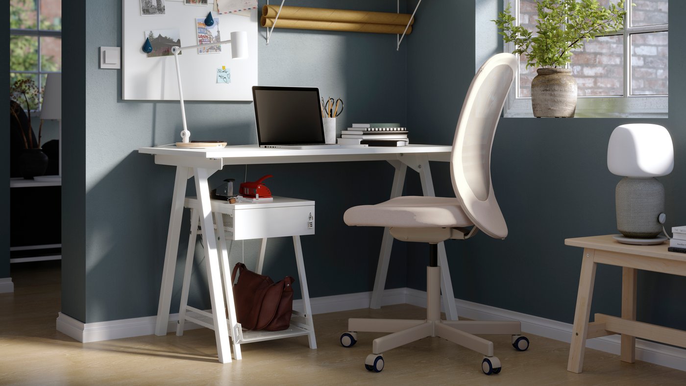 A beige FLINTAN office chair